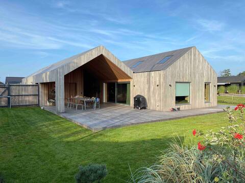 Modern wooden house near town & beach