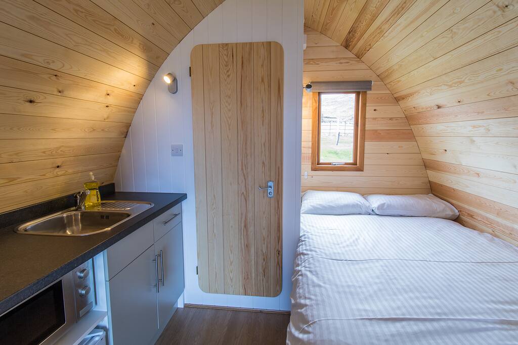 The kitchen and bed area in the Pod