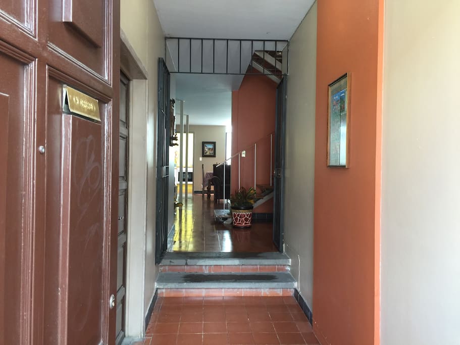 Front door & Hall way. Main entrance to home.