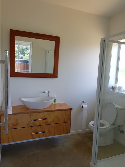 Two bathrooms - one main and one en-suite, both with shower
