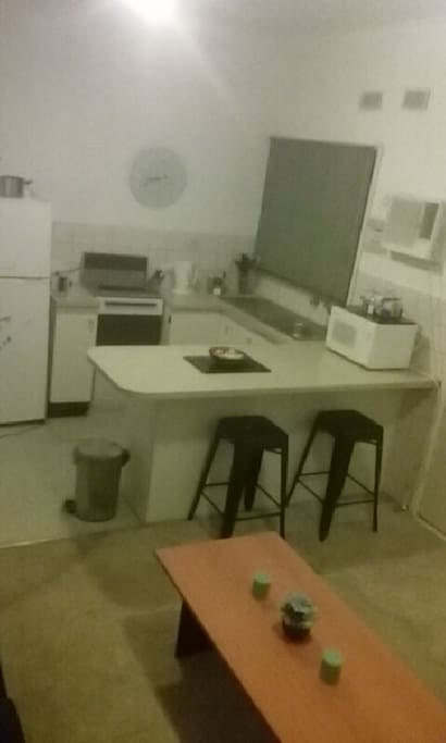Looking into kitchen from the bedroom door