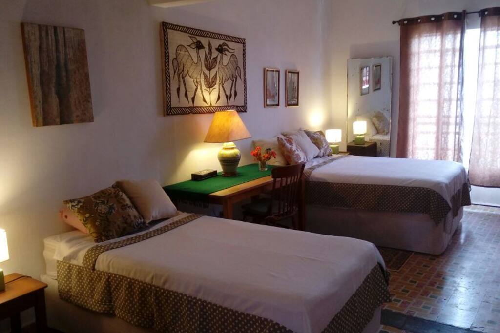 Recamara principal con cama matrimonial e individual