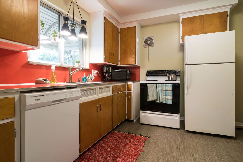 Vintage kitchen with updated amenities and appliances.