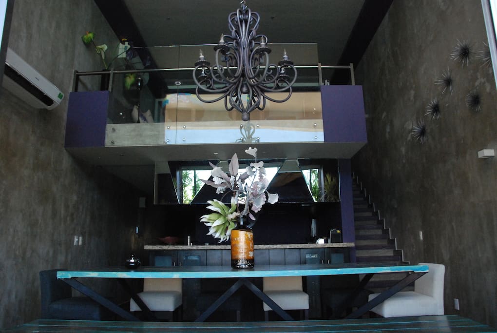the view from the dinning room to the living area