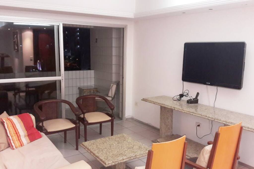 Sala de estar com sacada