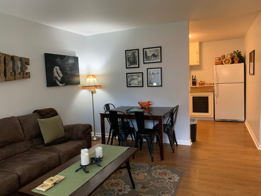 Table for four or more (there's extra fold out chairs in one of the bedroom closets)