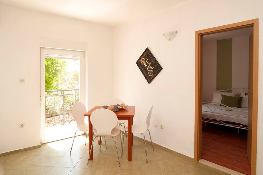 Living room with kitchen and sofa bed