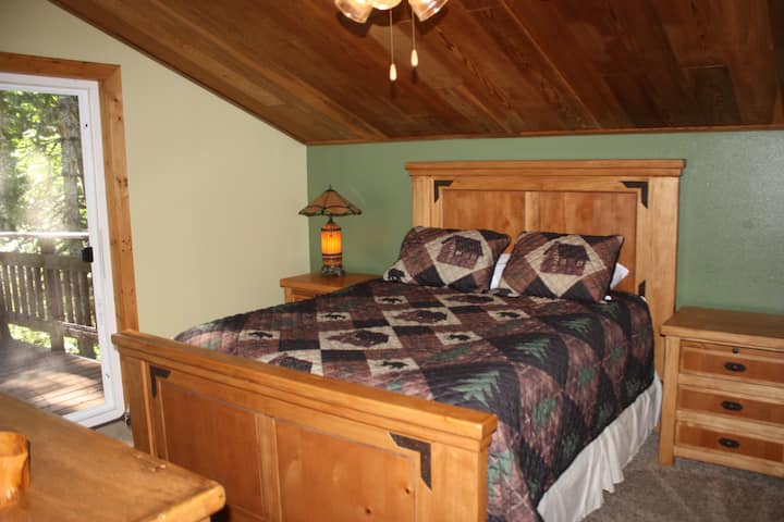 Master #1 has a HUGE deck attached. With a queen bed and lodge style bedroom set.
