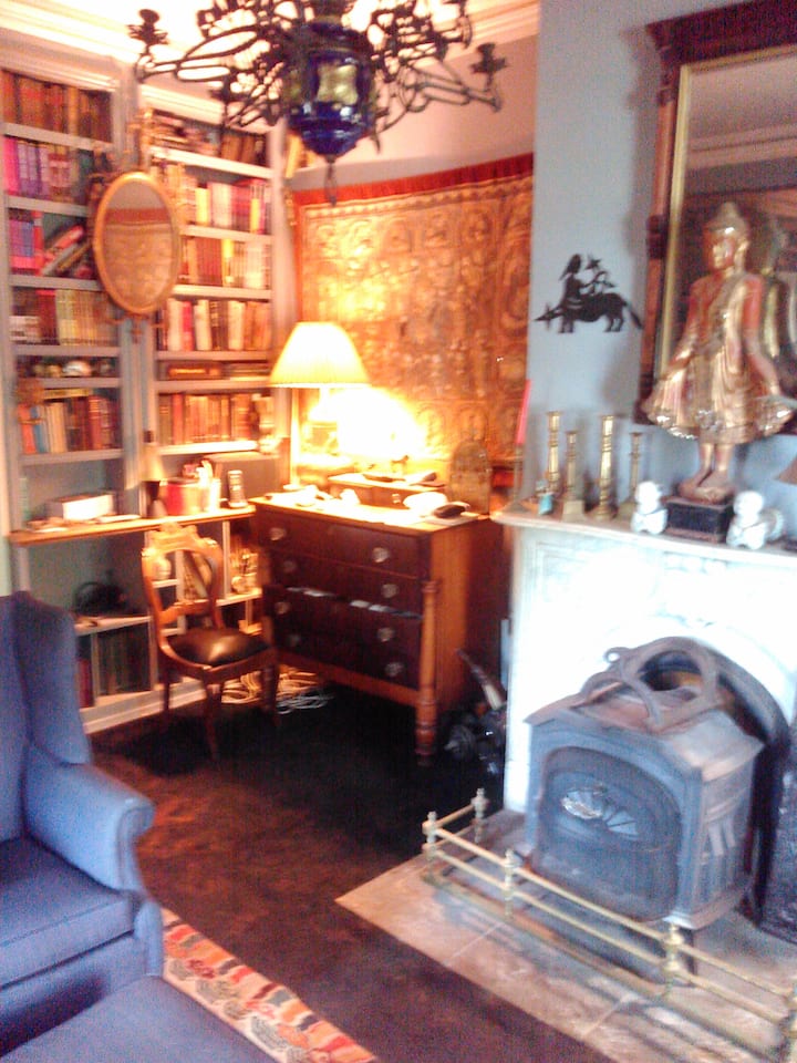 Your Library, with its wood-burning stove, is the 2nd of the two salons attached to the spaces you'll share with your entourage at Magnolia House.  Reading, literacy, show-biz, & an aggressive publishing agenda are alive & thriving at Magnolia House.