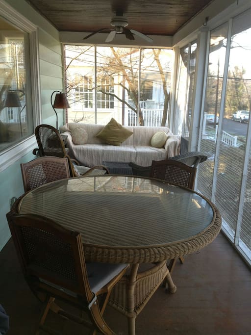 Front Porch with sofa, rocking chair, dining table or plug your computer here & enjoy the view while working. Ceiling fans to keep you cool :)