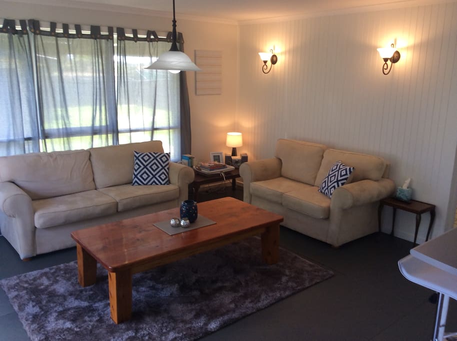 Spacious loungeroom with gas heater and split system (heater/air conditioner)