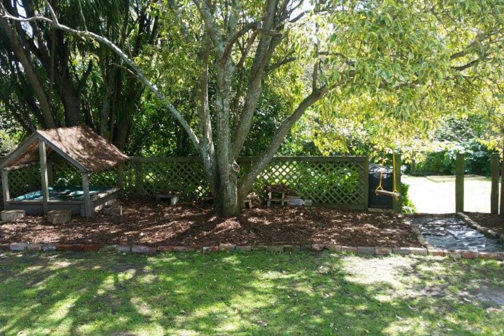 Our back yard. The pathway leads to a big vege garden with organic vegetables which are available to guests.