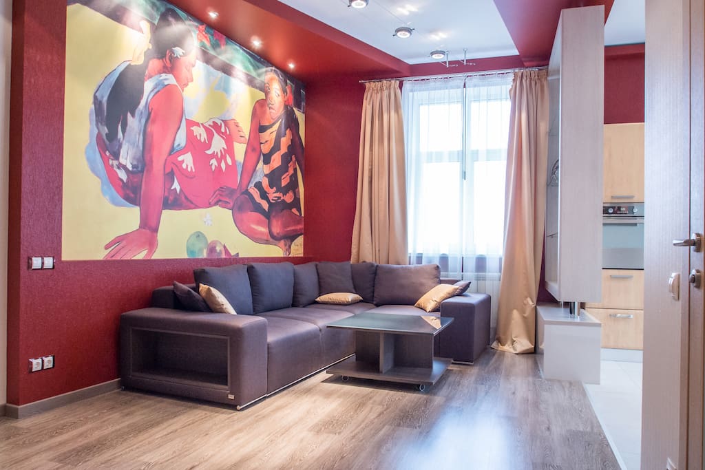 This livingroom contains L-shaped sofa, coffee table. Beautifully designed airconditioned room is full of natural light and air.