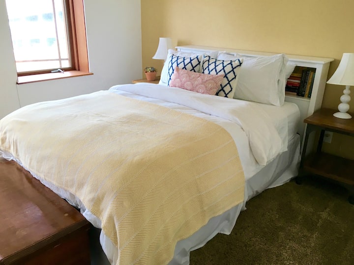 The house has two bedrooms, each with a queen bed . . .