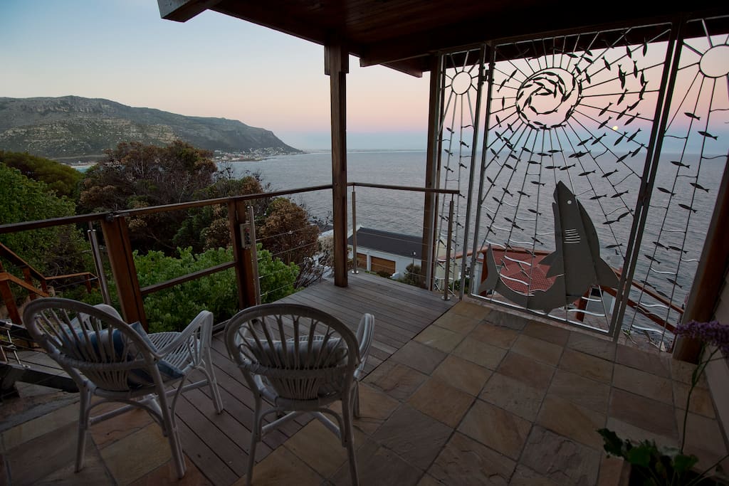 Dusk from the patio with the full moon rising over the ocean in False Bay.