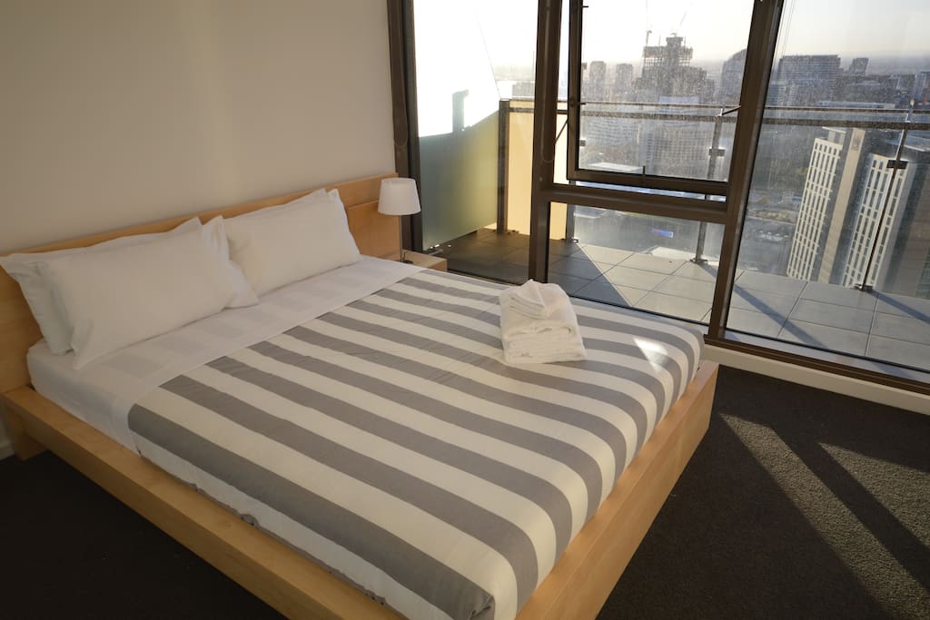 The main bedroom has stunning city views