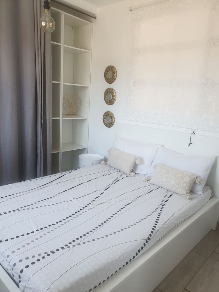 Habitación bohemia con vistas a la piscina