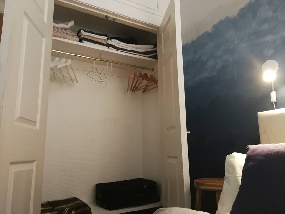 Spacious wardrobe for your luggage.