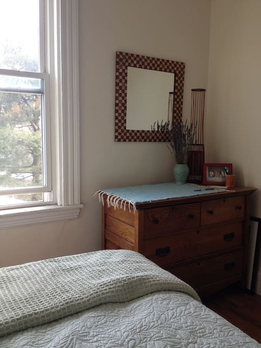 Dresser, chair, bowl and mirror from Indonesia, lamp from Brazil.