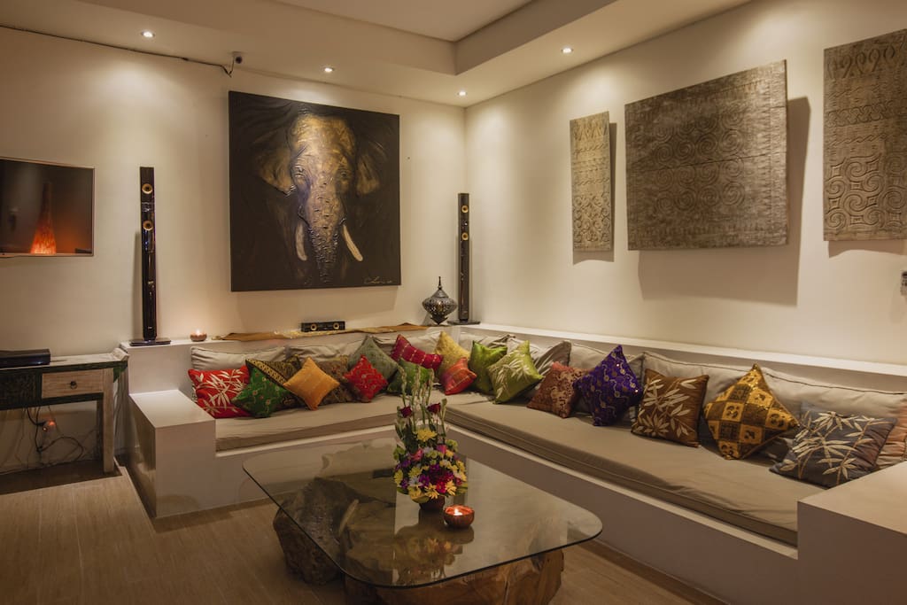 Comfortable lounge zone in living room with good quality sound system - that's what you need to relax with friends