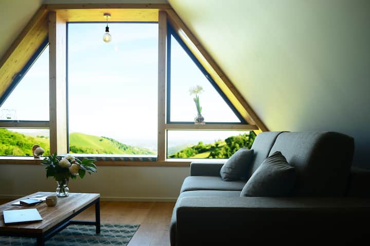 The living area with its very comfortable sofa bed offers completely unobstructed views of the Lourdes valley