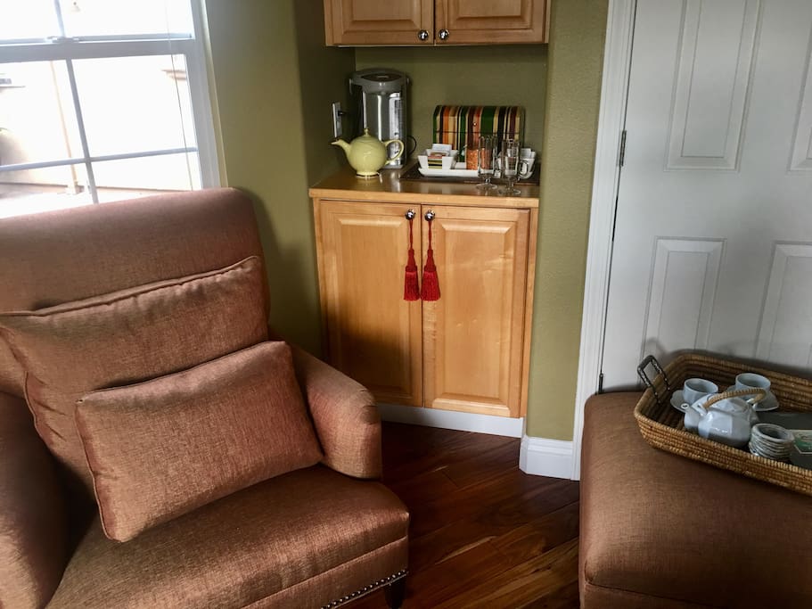 Snuggle up with a book in the library in this cozy Tea Nook.