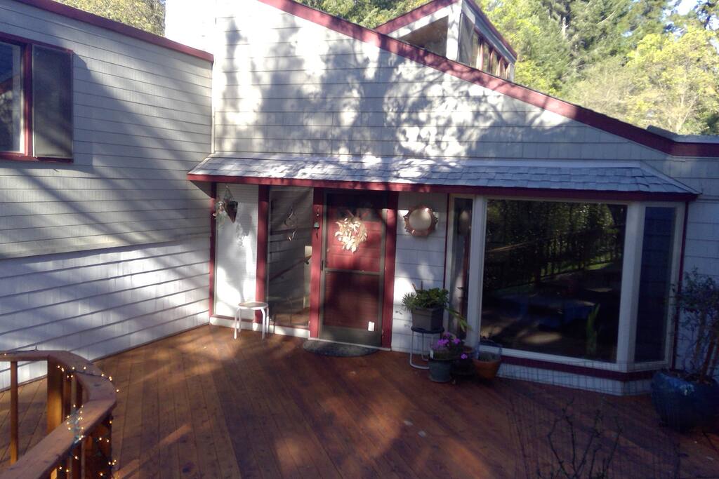 Front entrance, guest bedroom and bath are down a few steps to the left just inside the front door.