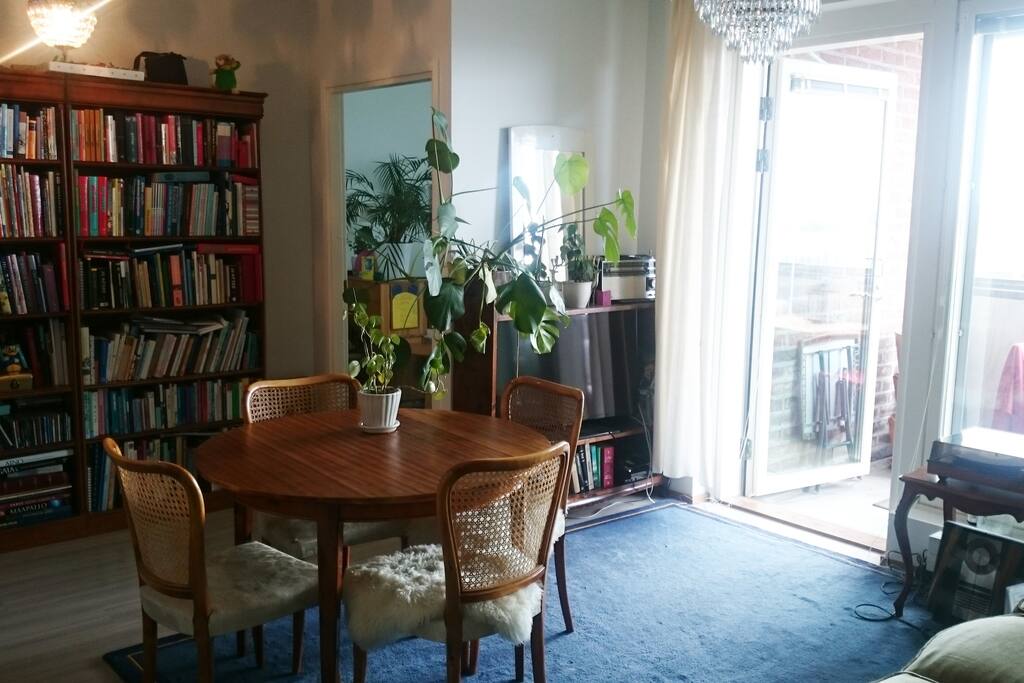 The livingroom has a telly, record player and the dining table (with the extension piece it serves up to eight people)