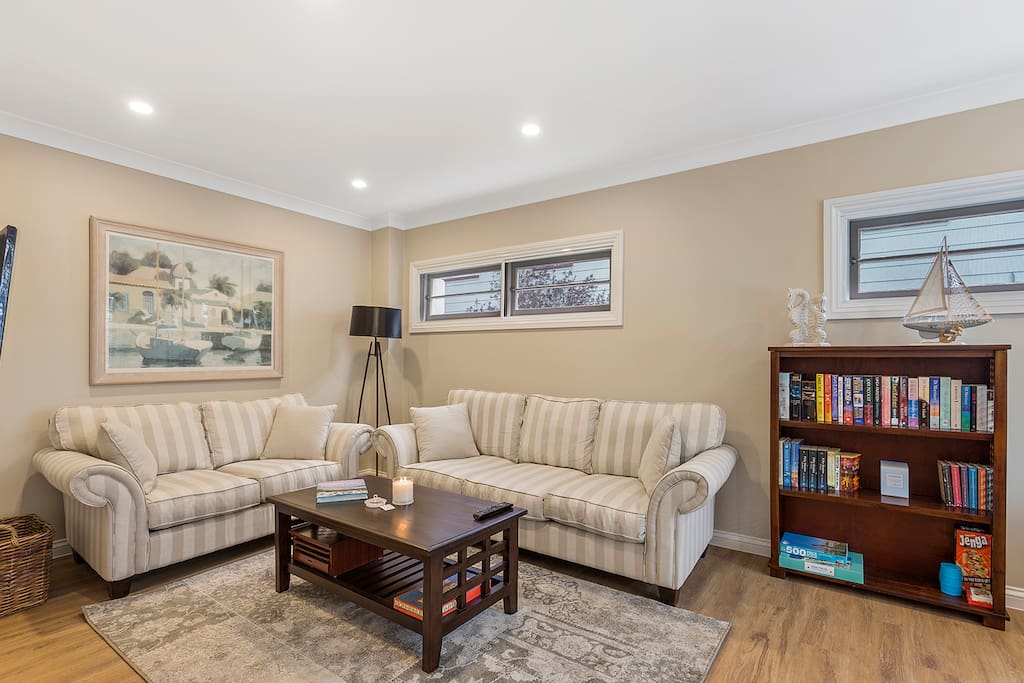 The front lounge room is a peaceful relaxing room to watch TV or take in the waterviews from the front windows.