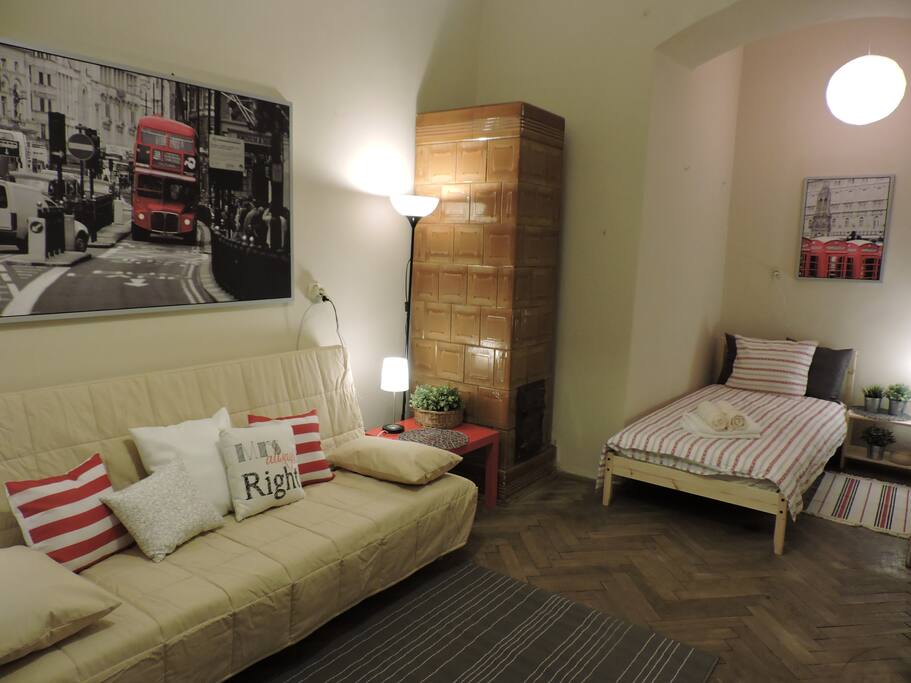 Room with 2 single beds and double sofa bed