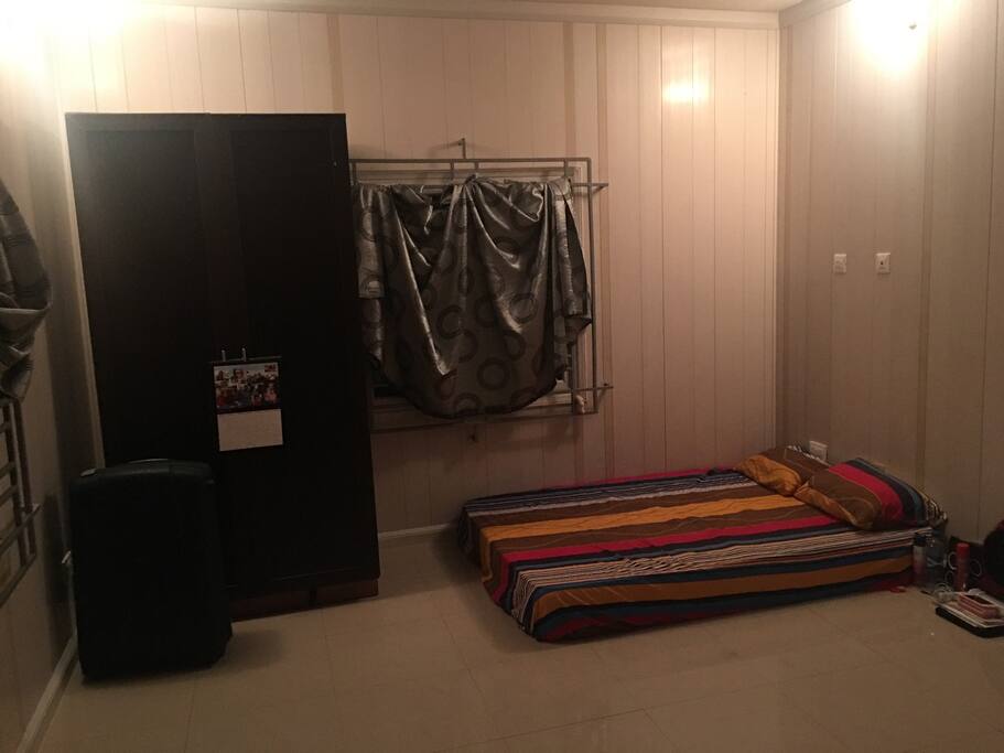 Your room. The curtains are going to be fully installed before you arrive. Extra mattress available.