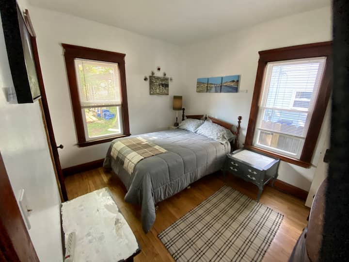 Bedroom one, wide-angle view (may appear larger)