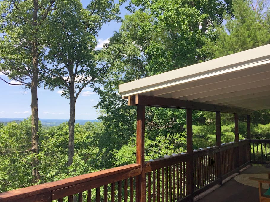 Enjoy amazing views rain or shine from our partially covered wrap around deck.
