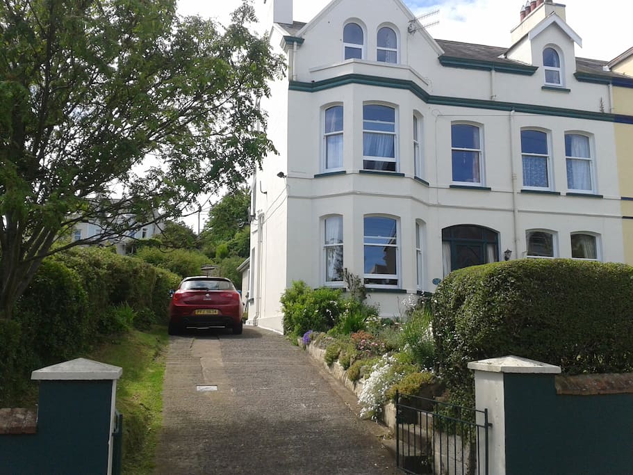 £ storey Victorian home, guest bathroom and seperate loo below guest floor with kitchen and guest living room on ground level.