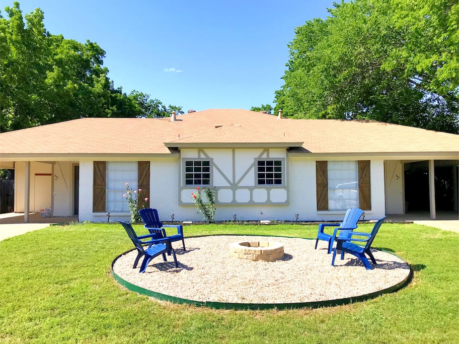 Front of duplex with fire pit to enjoy nature and relax.