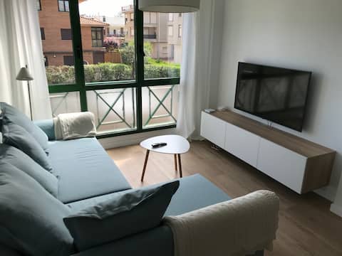 Bright apartment with pool close to the beach