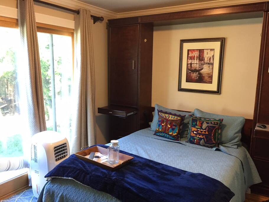 Bright room with blackout shades to keep room cool and an air-conditioned during the warmer months