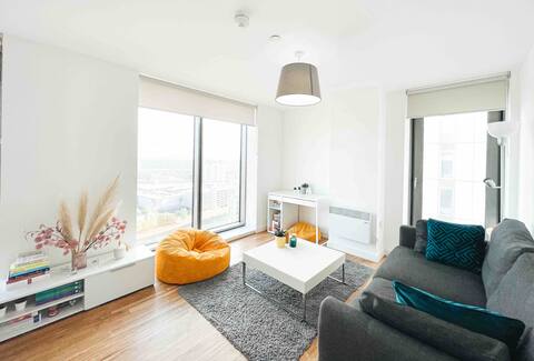 Modern and homey place in a high rise building.