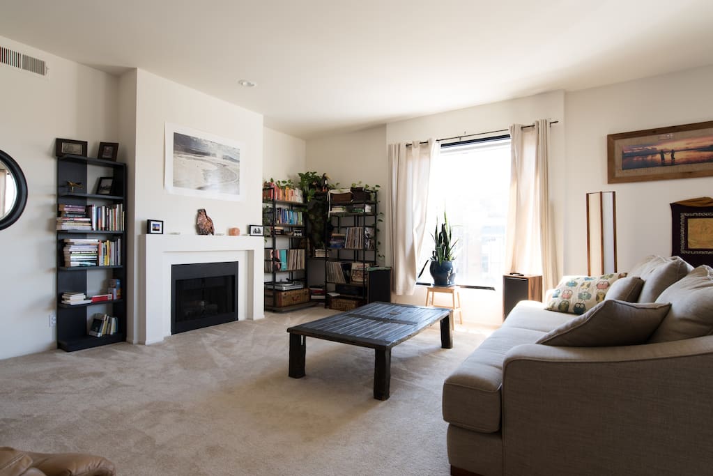 Spacious living space, which opens up to the balcony.