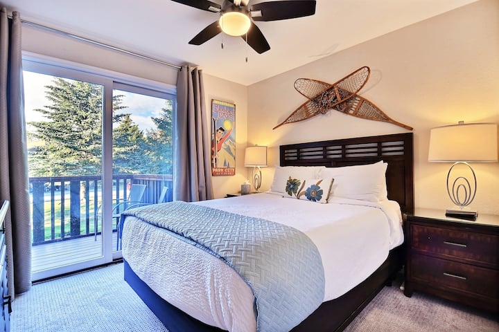 Queen Guest Suite with comfy linens and bedding,  HDTV, closet, back deck with stream views