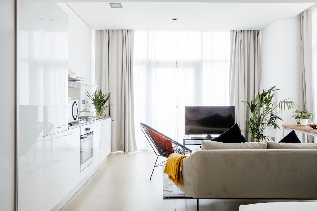 Open plan living space with urban accents