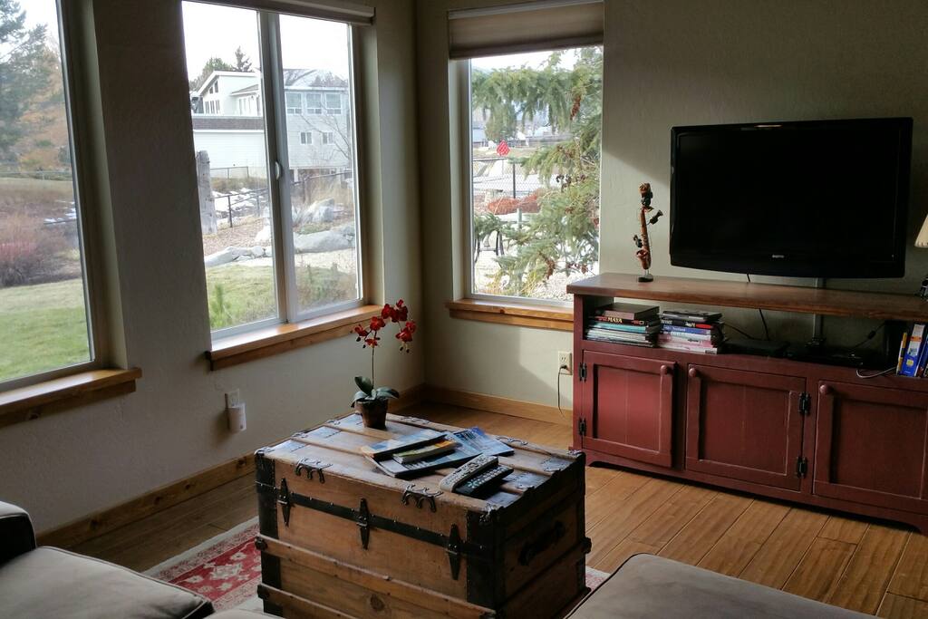 Sunny windows with views to the garden and mountains