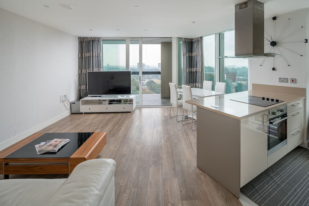 The open-plan living, dining and kitchen area is light and airy.