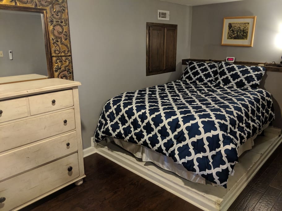 Enjoy a new queen bed with microfiber sheets.