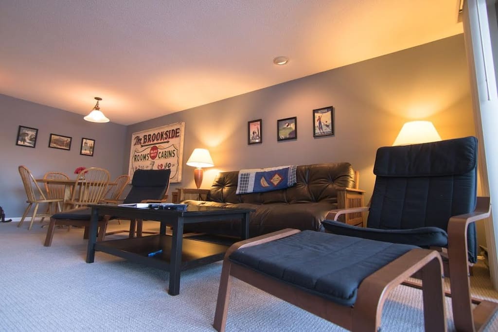 Leather futon easily folds out to a queen size bed.