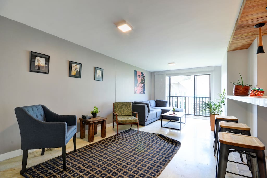Living room from a different angle + balcony