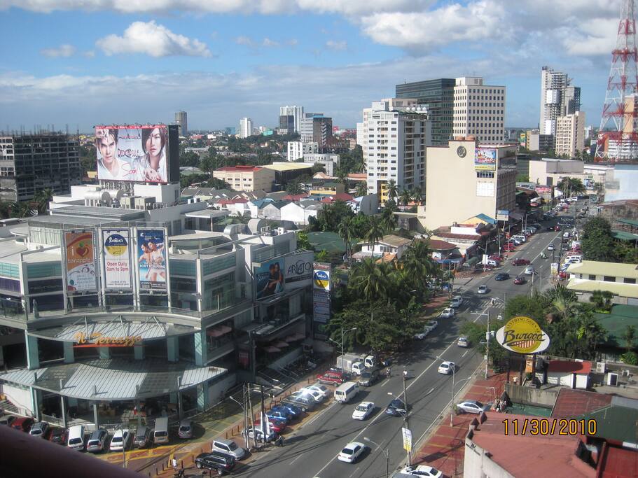 View from Bedroom 1 acrross the street is the Supermarket, to your right ABS CBN & GMA Network right down the street, and numerous restaurants all along the strip.