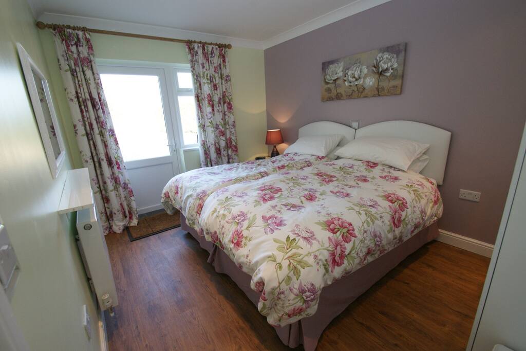 twin beds or a zip linked superking in main bedroom. disabled parking right outside this room.