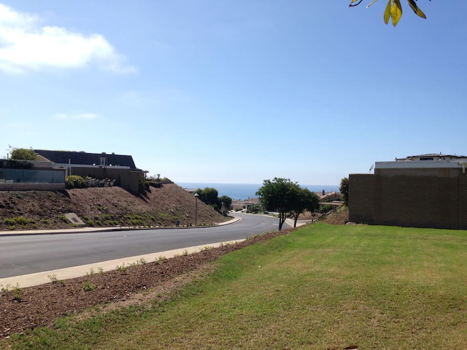 View from backyard with ocean within walking distance