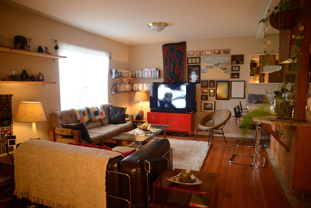 cozy living room with 55" HD flatscreen TV